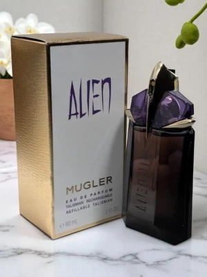 Alien By Mugler 2 oz/60 ml eau de parfum para mujer recargable precio de venta sugerido por el fabricante $150 Foto 1 de 3