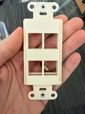 LEGRAND 4-PORT DECOR OUTLET STRAP, LIGHT ALMOND WP3414 LA NO PACKAGE OR SCREWS - Image 1 of 2