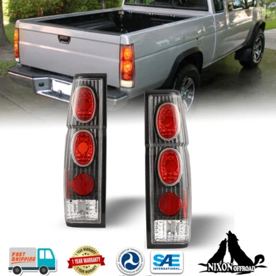 Par de luces traseras para camioneta Nissan D21 1986-1997 carrocería dura luces de freno traseras negras Foto 1 de 4