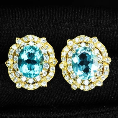 Pendientes de oro de 24 quilates de plata de ley 925 ovalados aguamarina azul marino prístino de 4,70 quilates Foto 1 de 4