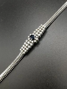 Bracciale flessibile in oro bianco con motivo centrale zaffiro e diamanti 24,4g - Foto 1 di 9