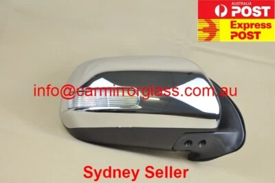 ESPEJO PUERTA TOYOTA HILUX SR5 2012-2015 LADO DERECHO NUEVO (CROMO, CON INTERMITENTE) Foto 1 de 3