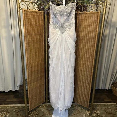 Size 6 Strapless Ivory Wedding Dress with Beaded Corset Top and Tulle Skirt - Image 1 of 4