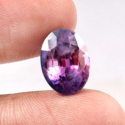 Zafiro bicolor natural AAA Ceilán 12x9 mm piedra preciosa suelta corte ovalado 7,90 quilates Foto 1 de 4