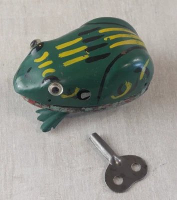 Ancien jouet mécanique, grenouille à clé, en tôle - Photo 1/4