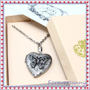 Collana con ciondolo farfalla follia Kirks tono argento - Foto 1 di 8