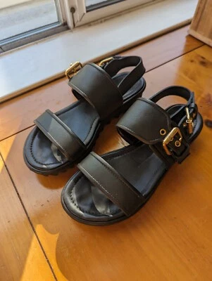 Sandalias Giuseppe Zanotti de cuero negras herrajes dorados 37 1/2 TALLA 7 Foto 1 de 4