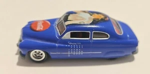 1949 Mercury Ford Ponton Lowrider Johnny Lightning Coca Cola calendario chica - Imagen 1 de 9