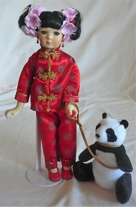 Porcelain China Doll with stand wearing two piece outfit with soft panda - Picture 1 of 2