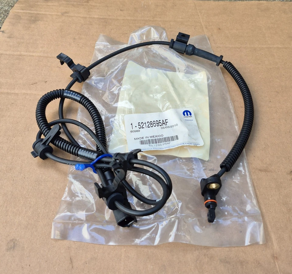 Jeep Liberty 2002-2007 nuevo sensor de freno antibloqueo delantero izquierdo MoPar genuino Foto 1 de 3