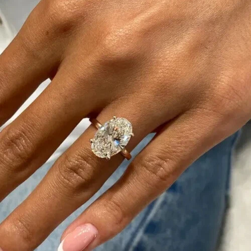 Сертифицированное IGI обручальное кольцо с одним бриллиантом овальной огранки 5 карат золото 14 карат - Изображение 1 из 4