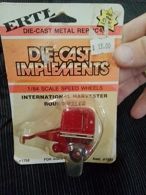 Empacadora redonda Ertl Die-Cast Implements International Harvester #1758 1:64 》1411 Foto 1 de 3