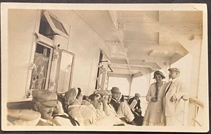RPPC REAL PHOTO POSTCARD CROWD OF PEOPLE SITTING ON DECK OF STEAMER - Picture 1 of 3