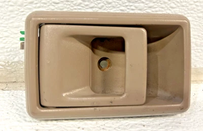 Toyota 4Runner y camioneta pickup 1990-1995 puerta interior izquierda tirador interior bronceado Foto 1 de 3