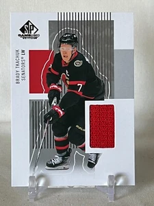 2022-23 SP Game Used Brady Tkachuk Retro Rookie Dbl Patch #RR-BT - Picture 1 of 2