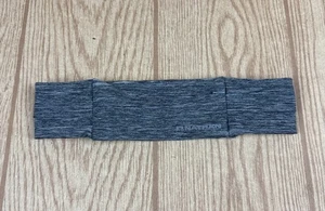 Paquete de cinturones ligeros para correr Nathan con varios bolsillos para teléfono geles gris pequeño - Imagen 1 de 5