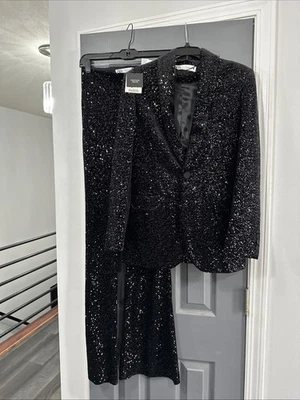 Traje de lentejuelas negro Zara para mujer chaqueta y pantalón pequeño nueva colección días festivos Foto 1 de 4