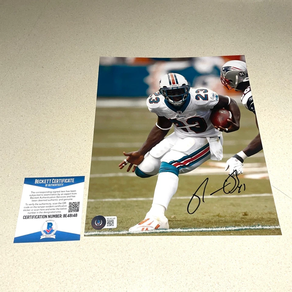 ФОТОГРАФИЯ РОННИ БРАУНА С АВТОГРАФОМ 8X10 МИАМИ ДЕЛЬФИНЫ БЕККЕТТ СЕРТИФИКАТ ПОДЛИННОСТИ BE48148 - Изображение 1 из 1