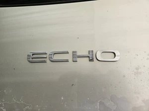 ✅️00-03 Toyota Echo Factory OEM Chrome Trunk Emblem Logo Badge Nameplate  - Picture 1 of 3