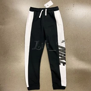 NUEVO CON ETIQUETAS Nike Niños DM8062-010 NSW Ropa deportiva Amplificar Pantalones para correr Negro Blanco Talla L - Imagen 1 de 14