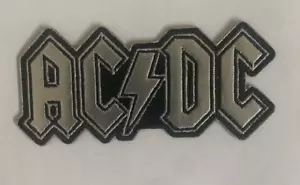 AC/DC CHROME LOGO SEW OR IRON ON CUT OUT PATCH OFFICIALLY LICENSED - Imagen 1 de 8