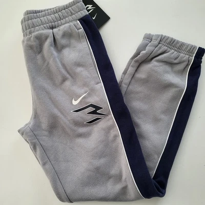 Pantalones de chándal Nike Big Boys polar talla 7 8 M L XL gris negro rojo marca 3 Foto 1 de 4