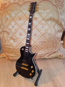 Miniguitarra ESP Ltd Les Paul similar de 25 cm con soporte Heavy Metal ¡condicional!(1-02) - Imagen 1 de 1