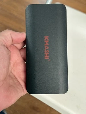 Banco de alimentación externo universal Kmashi K-MP816 negro/rojo 10000 mAh/37 Wh USB doble Foto 1 de 4