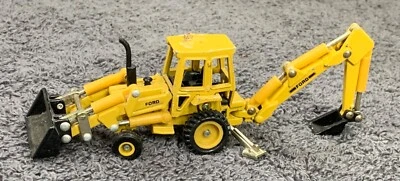 Vintage 1996 Ertl Ford Backhoe & Front Loader Yellow Metal Toy  - Image 1 of 4