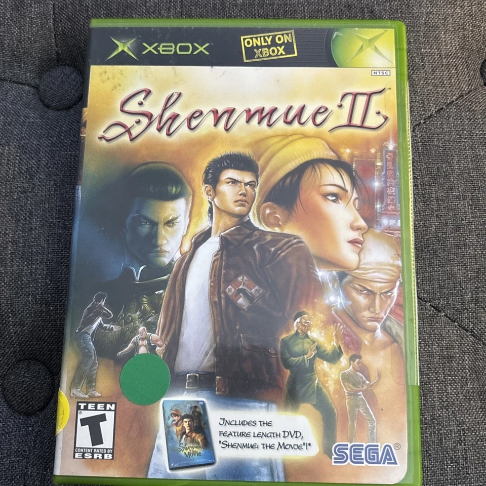 Shenmue II (Microsoft Xbox, 2002) CIB con película en DVD CASI COMO NUEVO - COMPLETO Foto 1 de 4
