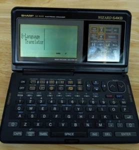 Organisateur de poche électronique vintage Sharp Wizard 64 Ko (oz-8000) + traducteur FONCTIONNE - Photo 1 sur 4