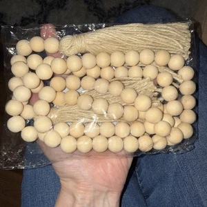 Holzperlen Girlande mit Ärger - Bild 1 von 4