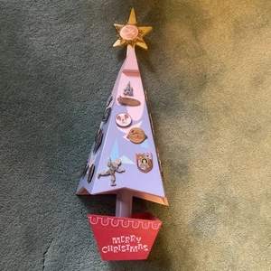 Caja musical Feliz Navidad Disneyland con 25 prendedores - Imagen 1 de 4