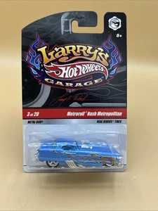 2009 HOT WHEELS LARRY’S GARAGE METRORAIL NASH METROPOLITAN BLUE W/ FLAMES - Bild 1 von 6