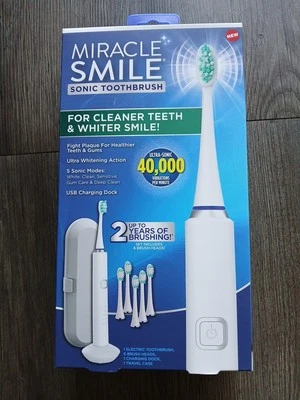 Cepillo de dientes sónico Miracle Smile, 5 velocidades sónicas, base de carga USB, con 6 cabezales Foto 1 de 4