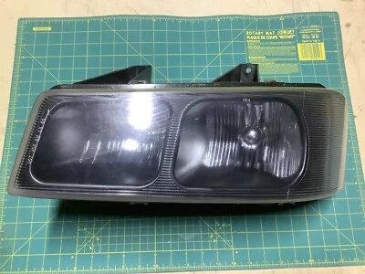 Headlamp assembly CHEVY/GMC van 03/22  left OEM - Image 1 of 4