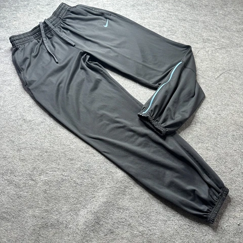 North Carolina Tar Heels Nike Track Pants Men LT Gray Tapered Ankle Zip 33.5" Cover