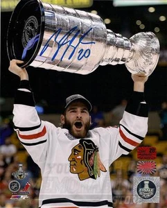 Brandon Saad Chicago Blackhawks signed raising Stanley cup 8x10 photo - Picture 1 of 1