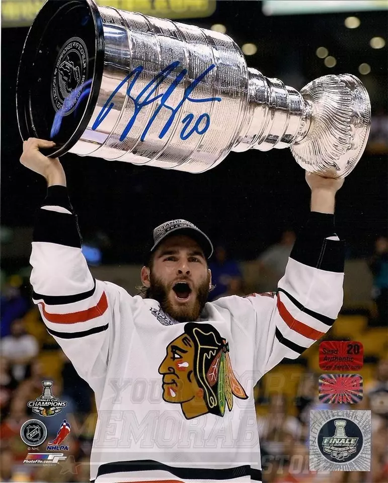 Brandon Saad Chicago Blackhawks signed raising Stanley cup 8x10 photo - Image 1 of 1