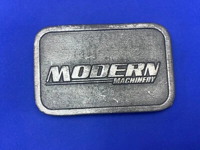 Maquinaria moderna revista desaparecida promoción hebilla de cinturón vintage de HITLINE EE. UU. Foto 1 de 4