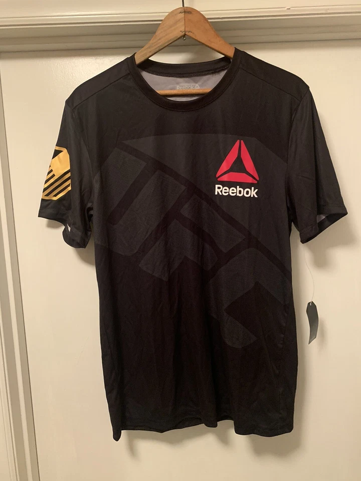 Nuevo Chris Weidman Reebok UFC Fight Kit Jersey Campeón Negro Dorado Camiseta Talla L Foto 1 de 4