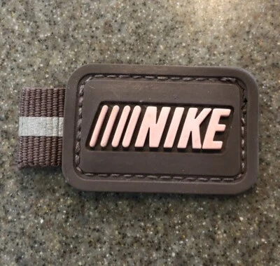 Nike Pull Tab Patch | Running Shoe Sneaker Skating Badge Logo Pink Rubber 1x1.5” - Image 1 of 4