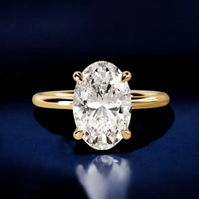 Bague de mariage en or jaune 14 carats et diamants taille ovale créée en labo... - Photo 1/4