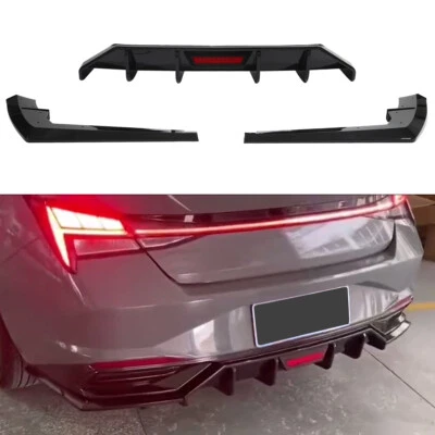 DIFUSOR TRASERO ALETA TIBURÓN NEGRO BRILLANTE HYUNDAI ELANTRA 2021+ CON LUZ DE FRENO LED Foto 1 de 4