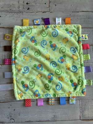 Manta de seguridad TaGgies verde amarillo etiquetas infantiles cintas encantadoras abejas suaves para bebés Foto 1 de 4