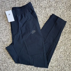 Nike Sportswear Commuter Tapered Leg Standard Fit Pants Men’s Sz Medium Black - Picture 1 of 11