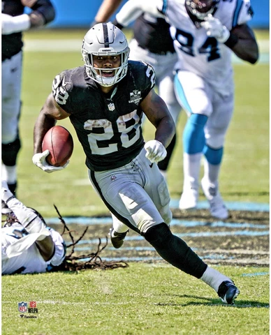 Josh Jacobs Las Vegas Raiders Unsigned First Las Vegas Win Vertical Cover