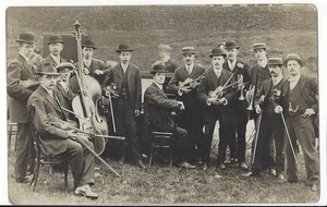 SOCIAL HISTORY - EDWARDIAN MEN WITH MUSICAL INSTRUMENTS IN A FIELD VIOLINS PIANO - Picture 1 of 2