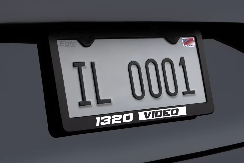 Marco de matrícula - Metal negro "1320 VIDEO" Ref Blanco Foto 1 de 1