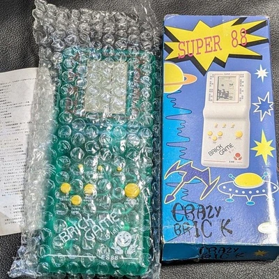 Brick Game 8 in 1 Tetris Retro Watch Shooting - Bild 1 von 4